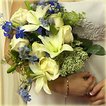 Hand held wedding bouquet with lilies, delphinium & queen annes lace for a garden look